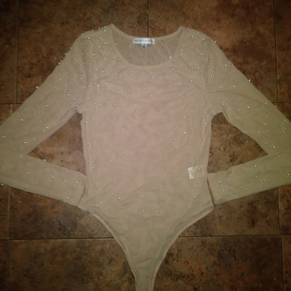 Nude size small one piece just like in the poctute